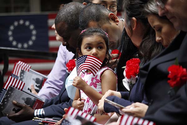 Thirteen immigrants become naturalized United States citizens on Flag Day
